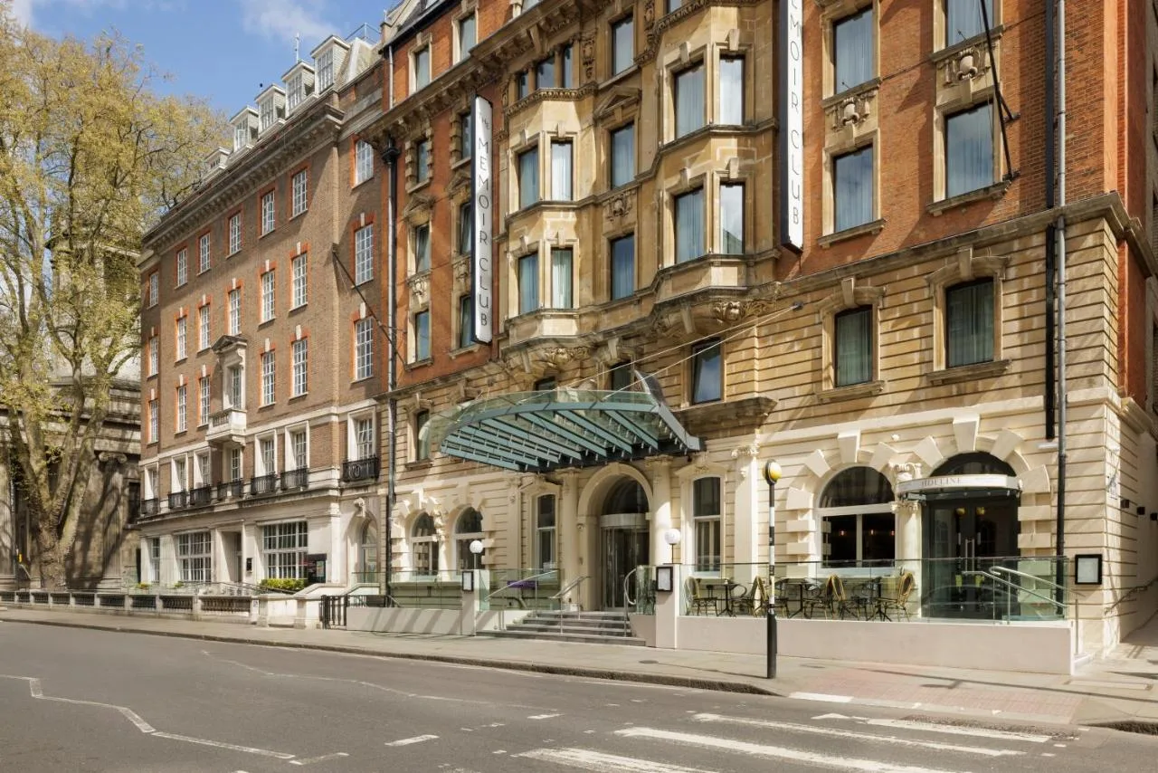 a large brick building on the side of a street at The Memoir Club in London